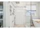 Close-up of glass shower and tub in a modern bathroom, with tile and elegant finishes at 6707 Meadow View Ct, Avon, IN 46123
