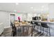 Kitchen with island seating and an adjoining eat-in kitchen table at 6707 Meadow View Ct, Avon, IN 46123