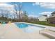 Enjoy outdoor living with a refreshing in-ground pool, lounge seating and charming backyard at 6707 Meadow View Ct, Avon, IN 46123