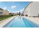 Backyard view with pool, lounge chairs, green grass, and deck at 6707 Meadow View Ct, Avon, IN 46123