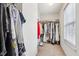 Walk-in closet with racks, shelves, and a window providing natural light at 6707 Meadow View Ct, Avon, IN 46123