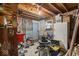 An unfinished basement with exposed pipes and a concrete foundation at 6853 Cordova Dr, Indianapolis, IN 46221