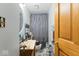 Compact bathroom featuring a shower with curtain and basic fixtures, offering essential functionality at 6853 Cordova Dr, Indianapolis, IN 46221