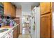 Shows kitchen cabinets with a view into another room, offering potential for open-concept living at 6853 Cordova Dr, Indianapolis, IN 46221