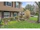 Close-up of the home's exterior with rock landscaping at 6853 Cordova Dr, Indianapolis, IN 46221