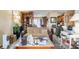 Comfortable living room with a sofa, table, and view into the kitchen at 6853 Cordova Dr, Indianapolis, IN 46221