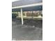 Carport parking area featuring numbered spaces and covered parking at 7411 Country Brook Dr, Indianapolis, IN 46260