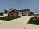Beautiful home with a brick facade, two-car garage, well-maintained lawn, and a concrete driveway at 7421 Broadview Ln, McCordsville, IN 46055