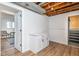 Partially finished basement with exposed ceiling and modern cabinets at 7624 Snowflake Dr, Indianapolis, IN 46227