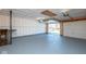 Spacious garage with an abundance of room and a large doorway at 7624 Snowflake Dr, Indianapolis, IN 46227