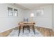 Bright home office with wood floors, natural light, desk, and minimalist decor at 7624 Snowflake Dr, Indianapolis, IN 46227