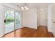 Bright breakfast nook with sliding glass door and hardwood floors at 8535 Olde Mill Circle West Dr, Indianapolis, IN 46260