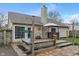 Backyard featuring a patio area, grassy lawn, and the rear of the home at 8747 Knotty Pine Ct, Indianapolis, IN 46227