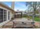 Backyard featuring a weathered deck, and an overhead shade structure at 8747 Knotty Pine Ct, Indianapolis, IN 46227