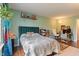 Cozy bedroom featuring stylish decor, wood floors, and ample natural light at 8747 Knotty Pine Ct, Indianapolis, IN 46227