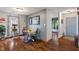 Cozy dining area featuring hardwood floors, creating a warm and inviting space for meals at 8747 Knotty Pine Ct, Indianapolis, IN 46227