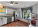 Well-lit kitchen features stainless steel appliances and ample counter space, perfect for cooking at 8747 Knotty Pine Ct, Indianapolis, IN 46227