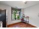 Bright kitchen with decorative glass window and stainless steel counter space for appliances and cooking at 8747 Knotty Pine Ct, Indianapolis, IN 46227