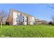 Expansive backyard with a pergola-covered patio and a two-story home at 8965 Snowberry Ct, Zionsville, IN 46077