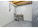 Unfinished basement with visible piping, cement floor, and a stainless steel utility sink at 8965 Snowberry Ct, Zionsville, IN 46077