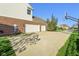 Spacious driveway leading to a three-car garage, complete with a basketball hoop at 8965 Snowberry Ct, Zionsville, IN 46077
