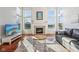 Cozy living room features fireplace and plenty of natural light at 8965 Snowberry Ct, Zionsville, IN 46077