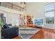 Open concept living room showcases hardwood floors and modern design at 8965 Snowberry Ct, Zionsville, IN 46077