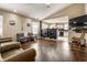 Spacious living room featuring hardwood floors, vaulted ceilings and an open layout at 8973 Sunningdale Blvd, Indianapolis, IN 46234