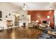 Cozy living room offering hardwood floors, a ceiling fan and an open floor plan at 8973 Sunningdale Blvd, Indianapolis, IN 46234