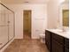 Full bathroom featuring a glass door shower and vanity with white countertop at 904 Adena Ln, Westfield, IN 46074
