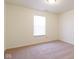 Bedroom featuring beige carpet, cream walls, and a sunlit window at 904 Adena Ln, Westfield, IN 46074