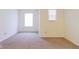 A bright bedroom featuring neutral walls, carpet, and natural light from the window at 904 Adena Ln, Westfield, IN 46074