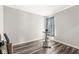 The bedroom features laminate floors and a window at 9925 Glendon Ct, McCordsville, IN 46055