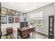 Home office features a desk and view of the neighborhood at 9925 Glendon Ct, McCordsville, IN 46055