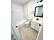Bright bathroom with a tub-shower combination, modern vanity, and tile flooring for a clean and contemporary look at 10200 Cheswick Ln, Fishers, IN 46037