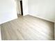 Bright bedroom with modern flooring, freshly painted walls, and ample natural light, offering a serene living space at 10200 Cheswick Ln, Fishers, IN 46037