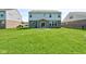Spacious backyard with well-maintained lawn perfect for gatherings and outdoor enjoyment at 10602 Pintail Ln, Indianapolis, IN 46239