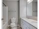 Functional bathroom featuring a double sink vanity and a combined shower-tub at 10602 Pintail Ln, Indianapolis, IN 46239
