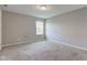 Neutral bedroom with carpet and a window provides ample natural light at 10602 Pintail Ln, Indianapolis, IN 46239