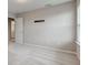 Spacious bedroom with neutral walls, plush carpeting, and a large window at 10602 Pintail Ln, Indianapolis, IN 46239