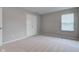 Bright bedroom with double door closet and window with blinds at 10602 Pintail Ln, Indianapolis, IN 46239