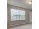 Bedroom featuring natural light from a large window with blinds at 10602 Pintail Ln, Indianapolis, IN 46239
