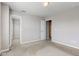 This is a light-filled bedroom featuring neutral walls and carpeted floors at 10602 Pintail Ln, Indianapolis, IN 46239