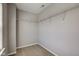 A basic walk-in closet featuring wire shelving for storage solutions at 10602 Pintail Ln, Indianapolis, IN 46239