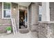 Warm entryway featuring a welcoming sign and a glimpse of the interior at 10602 Pintail Ln, Indianapolis, IN 46239