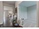 Bright living room with hardwood floors and French doors leading to an office at 10602 Pintail Ln, Indianapolis, IN 46239