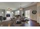 Cozy interior showcasing a fireplace, dining table, and inviting seating area perfect for relaxation at 10602 Pintail Ln, Indianapolis, IN 46239