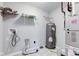 Efficient utility room showcasing the water heater and furnace system at 10602 Pintail Ln, Indianapolis, IN 46239