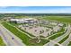 Stunning aerial view of a modern building with ample parking and meticulously landscaped surroundings at 11054 N Shelby 490 W, New Palestine, IN 46163