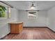 This living room features hardwood floors and a serving bar at 11054 N Shelby 490 W, New Palestine, IN 46163